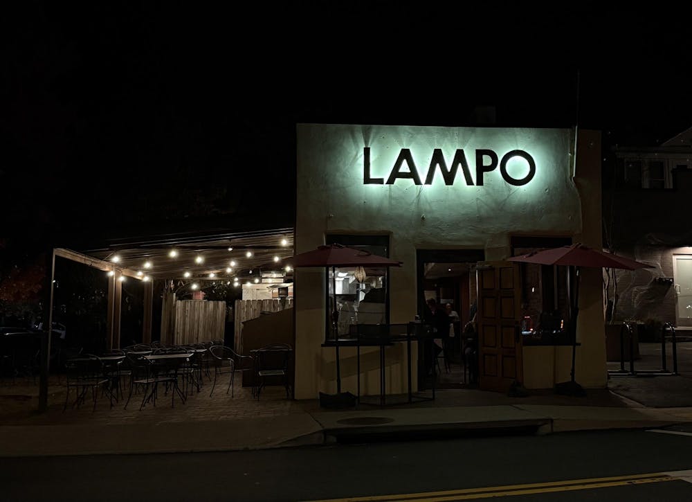 The restaurant, a narrow, pale yellow building with backlit letters, was much smaller than I’d initially perceived from driving by so many times.