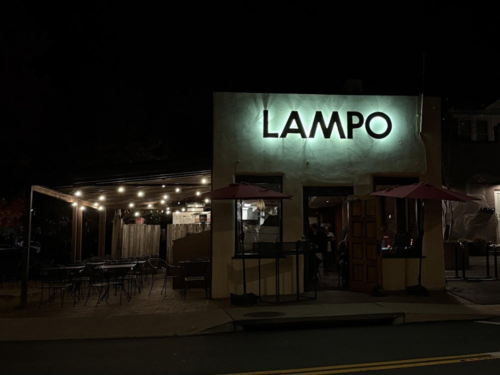 The restaurant, a narrow, pale yellow building with backlit letters, was much smaller than I’d initially perceived from driving by so many times.