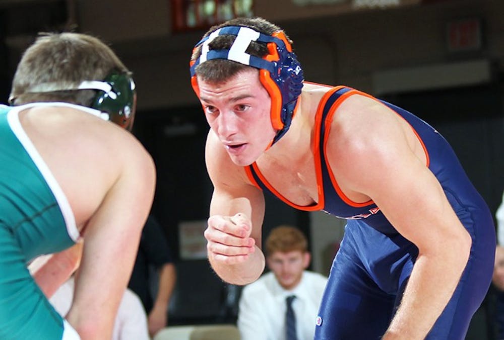 <p>Senior Justin Van Hoose upset Pittsburgh's nationally ranked junior Mikey Racciato to begin Friday's competition. No. 20 Virginia went on to lose in the final bout for the second straight match, though.&nbsp;</p>