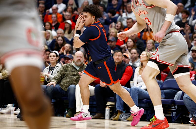 No. 15 Virginia scrapes by in messy neutral-site battle with Ohio State