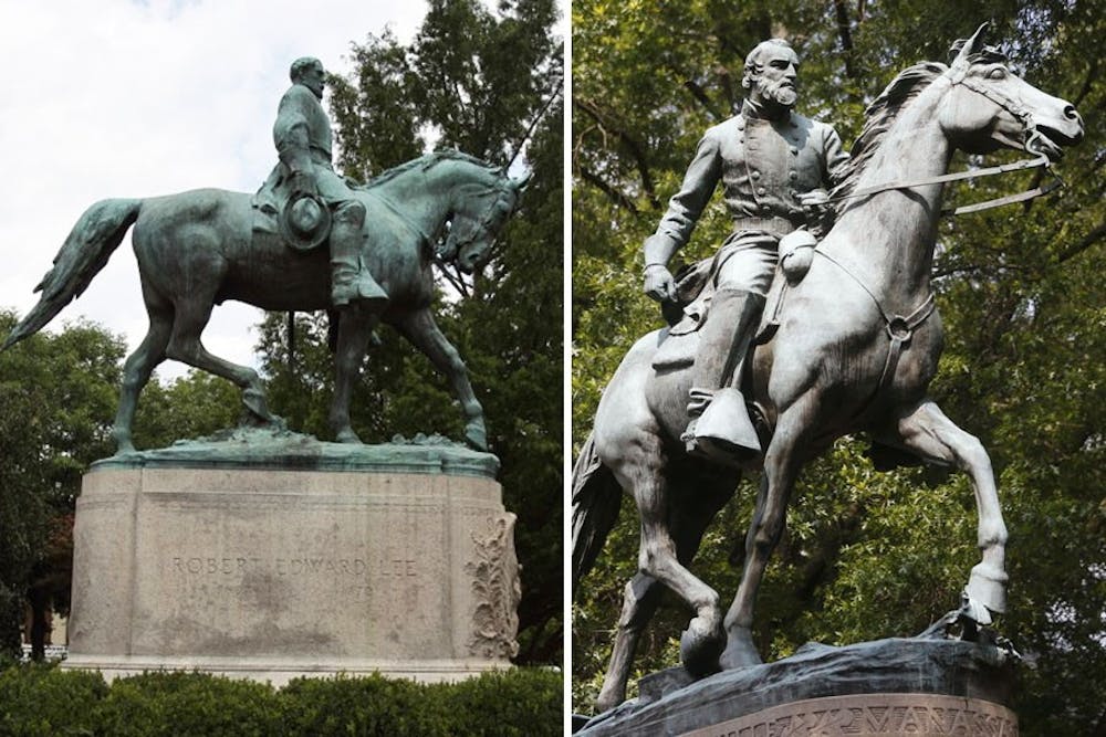 <p>The Robert E. Lee statue (left) and Stonewall Jackson statue (right) were funded by McIntire.&nbsp;</p>