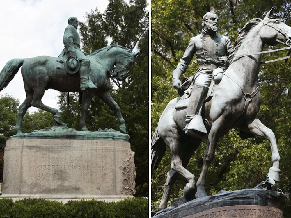 The Robert E. Lee statue (left) and Stonewall Jackson statue (right) were funded by McIntire.&nbsp;
