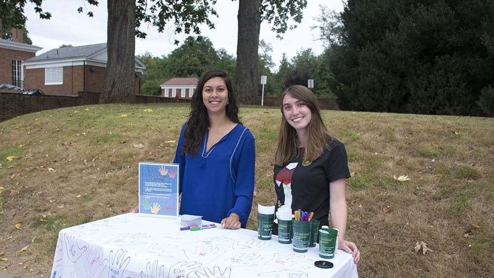 Volunteers manned tables on the lawn all week&nbsp;for students to sign the pledge and trace their hands on a banner.&nbsp;