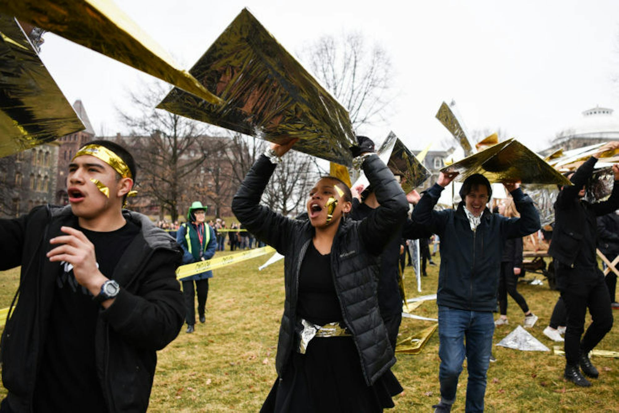 The first-year architecture students each claim a scale from the dragon after the parade as recognition of their hard work over the past few weeks.