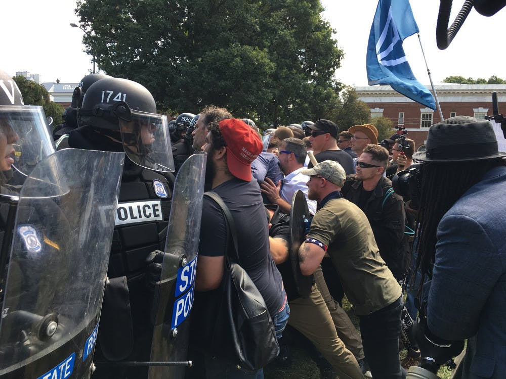 1920px-White_supremacists_clash_with_police_36421659232