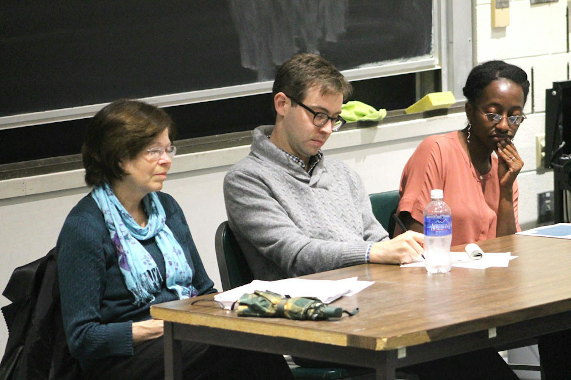 Government professors Elizabeth Sanders, David Bateman and Jamila Michener address the societal and economic implications of big money in politics at a panel discussion Tuesday. (Michela Brew / Sun Sports Photography Editor)