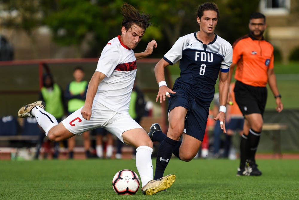 Pg-14-Soccer-Boris-Tsang-Sun-Photography-Editor