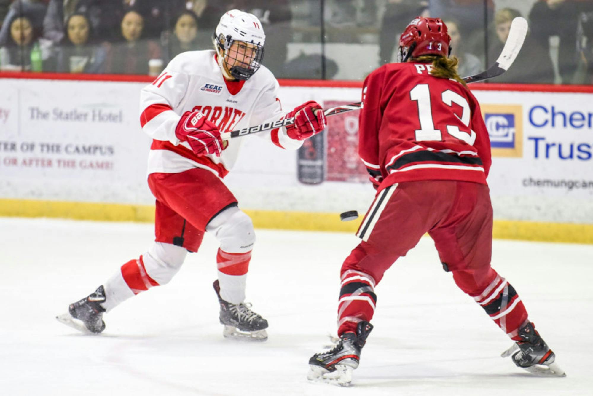 Sophomore forward Gillis Frechette slices the Lynah Rink air with her hockey stick at the women's ECAC semifinals against Harvard on Saturday. (Boris Tsang/Sun Photography Editor)
