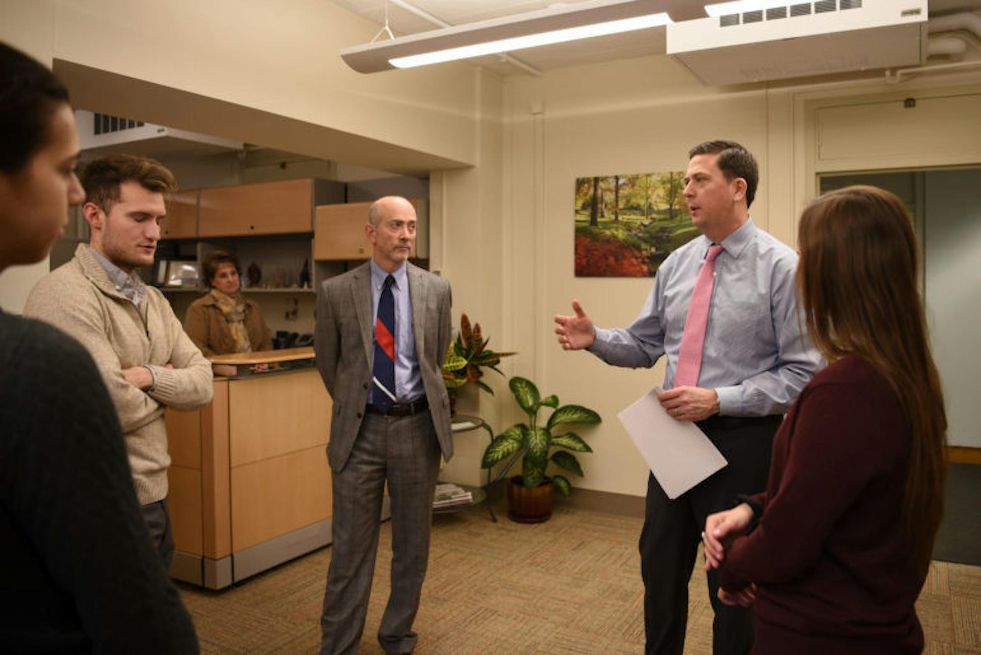 Vice President of Student and Campus Life Ryan Lombardi speaks with members of the Mental Health Task Force on Friday after they submitted a letter outlining recommendations for improving Cornell's mental health services. (Boris Tsang / Sun Assistant Photography Editor)