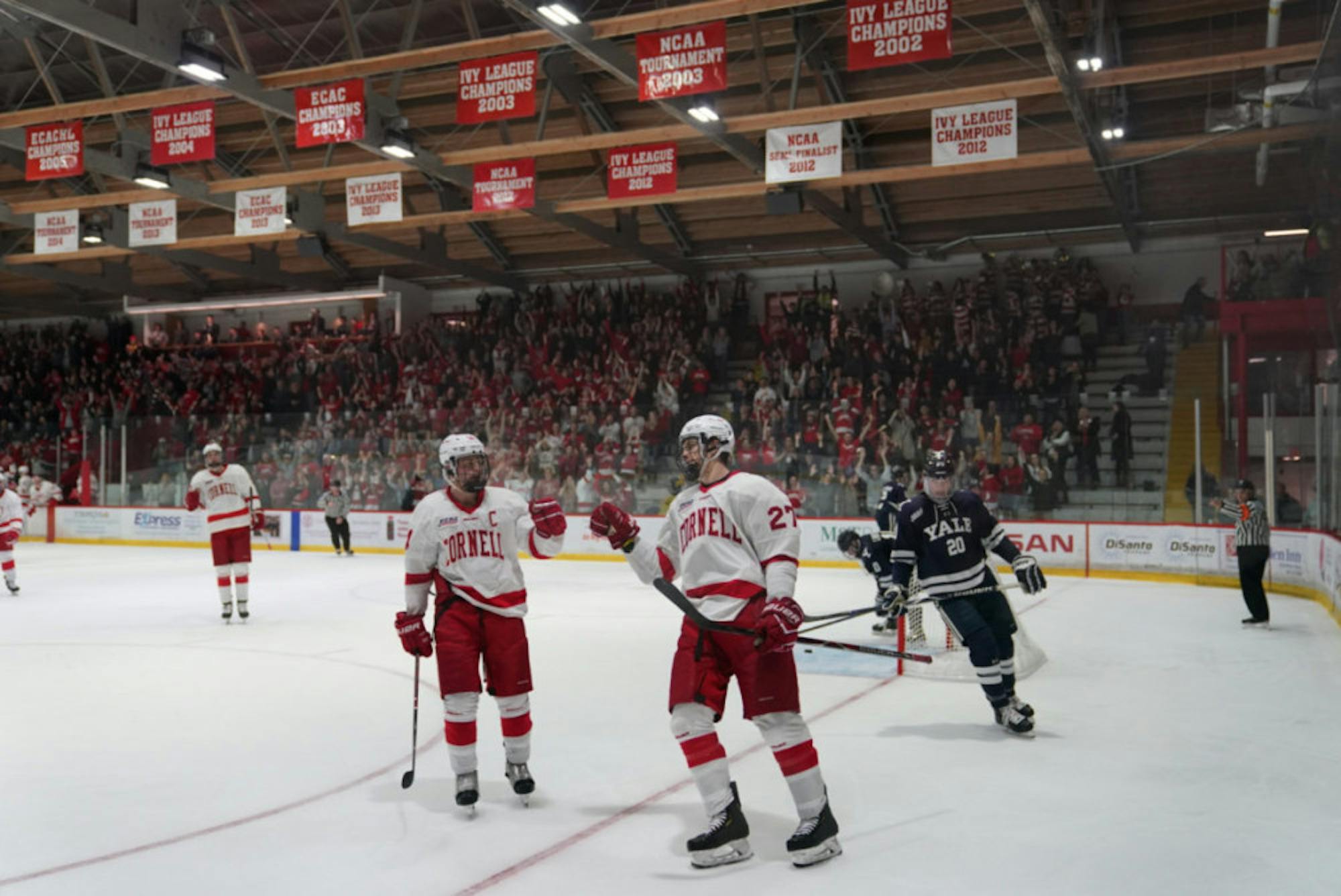 Morgan Barron (No. 27, above) scored an empty-net goal in the final minute to squash a Yale comeback bid.