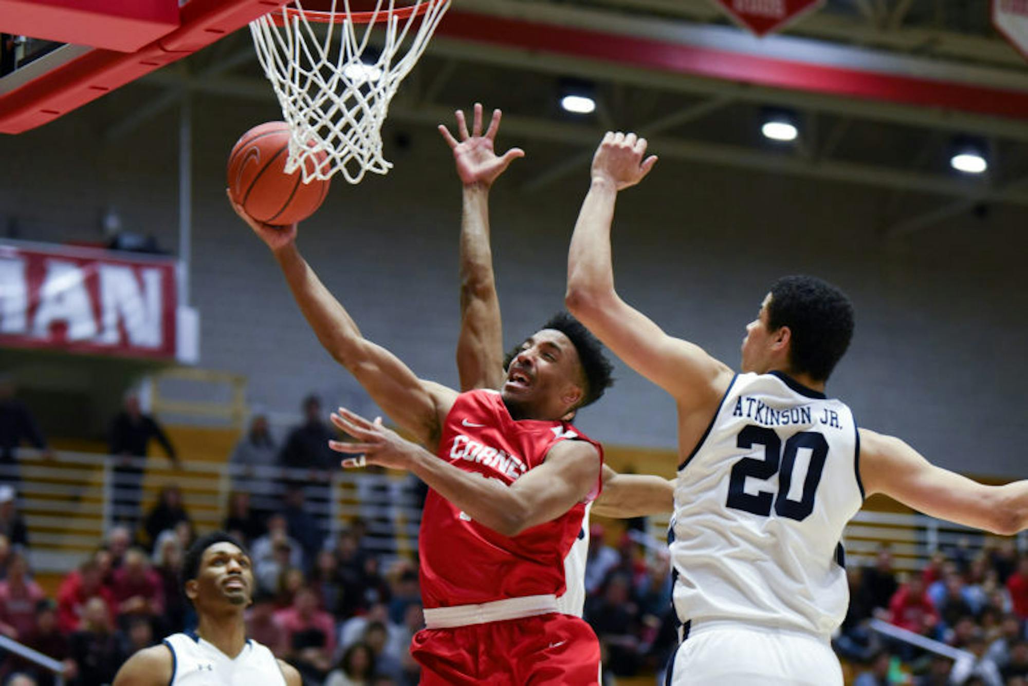 Senior guard Matt Morgan goes to the rim after splitting the Yale defense at the men's basketball game on Saturday. Although Morgan set a Cornell men’s basketball Newman Arena record with 35 points, the Red struggled to contain the Bulldogs' offense, falling 98-92. (Boris Tsang / Sun Assistant Photography Editor)