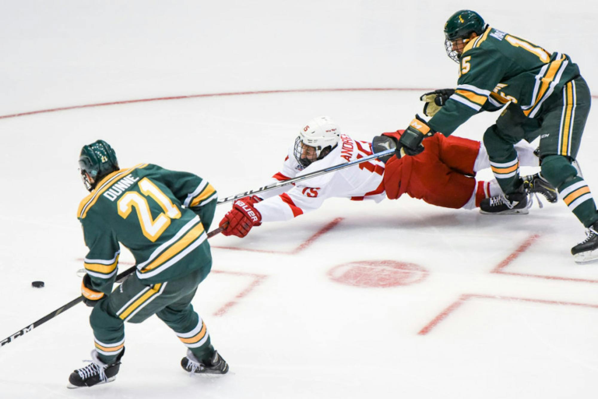 Freshman forward Max Andreev sprawls for a puck in the loss to Clarkson.