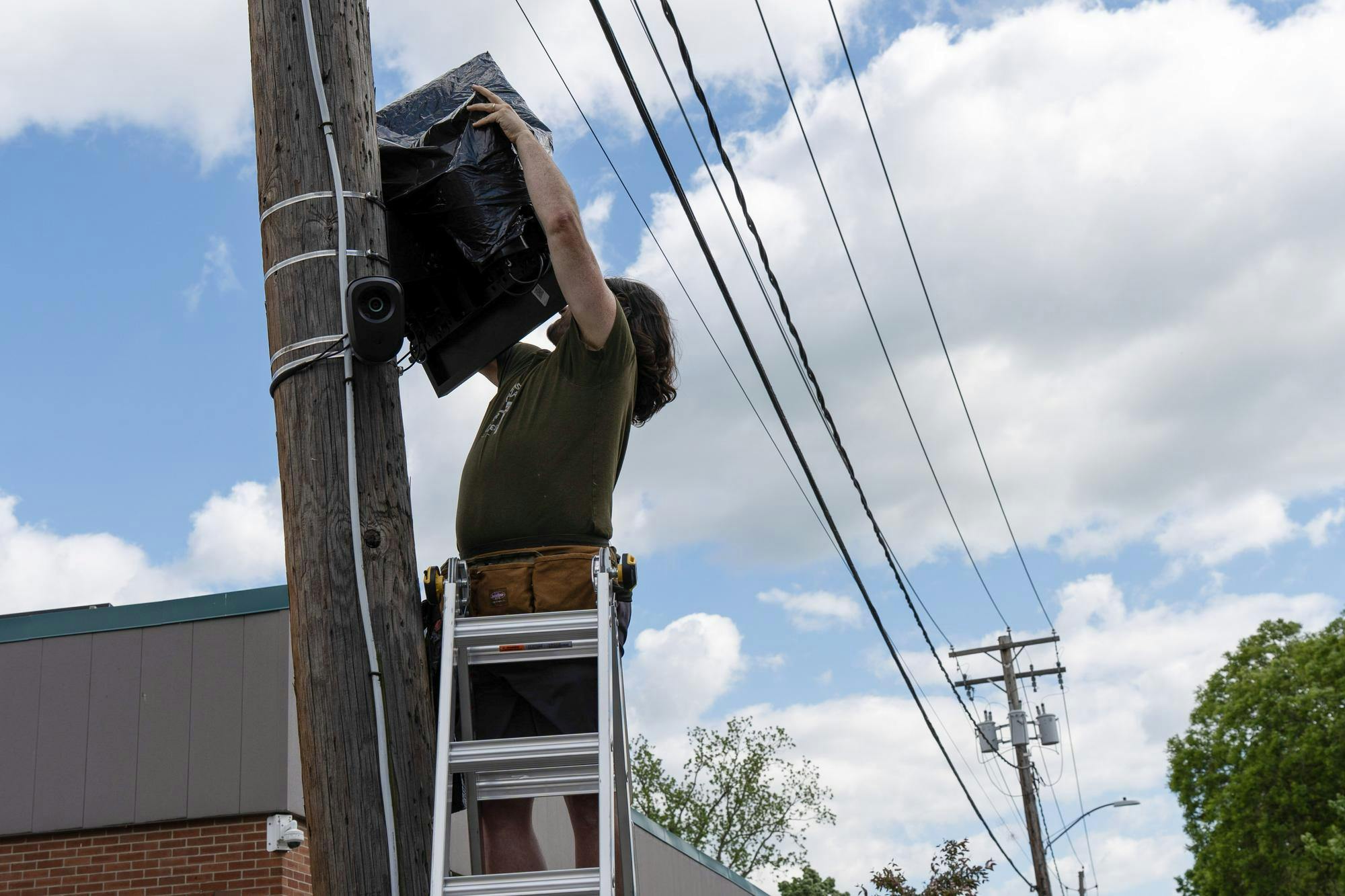 Demonstrator Covers up Flock Camera