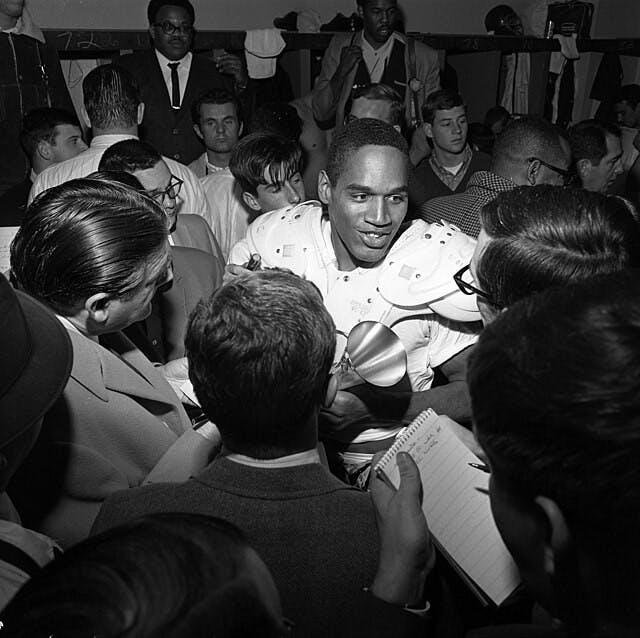 O.J._Simpson_talking_to_reporters_1967