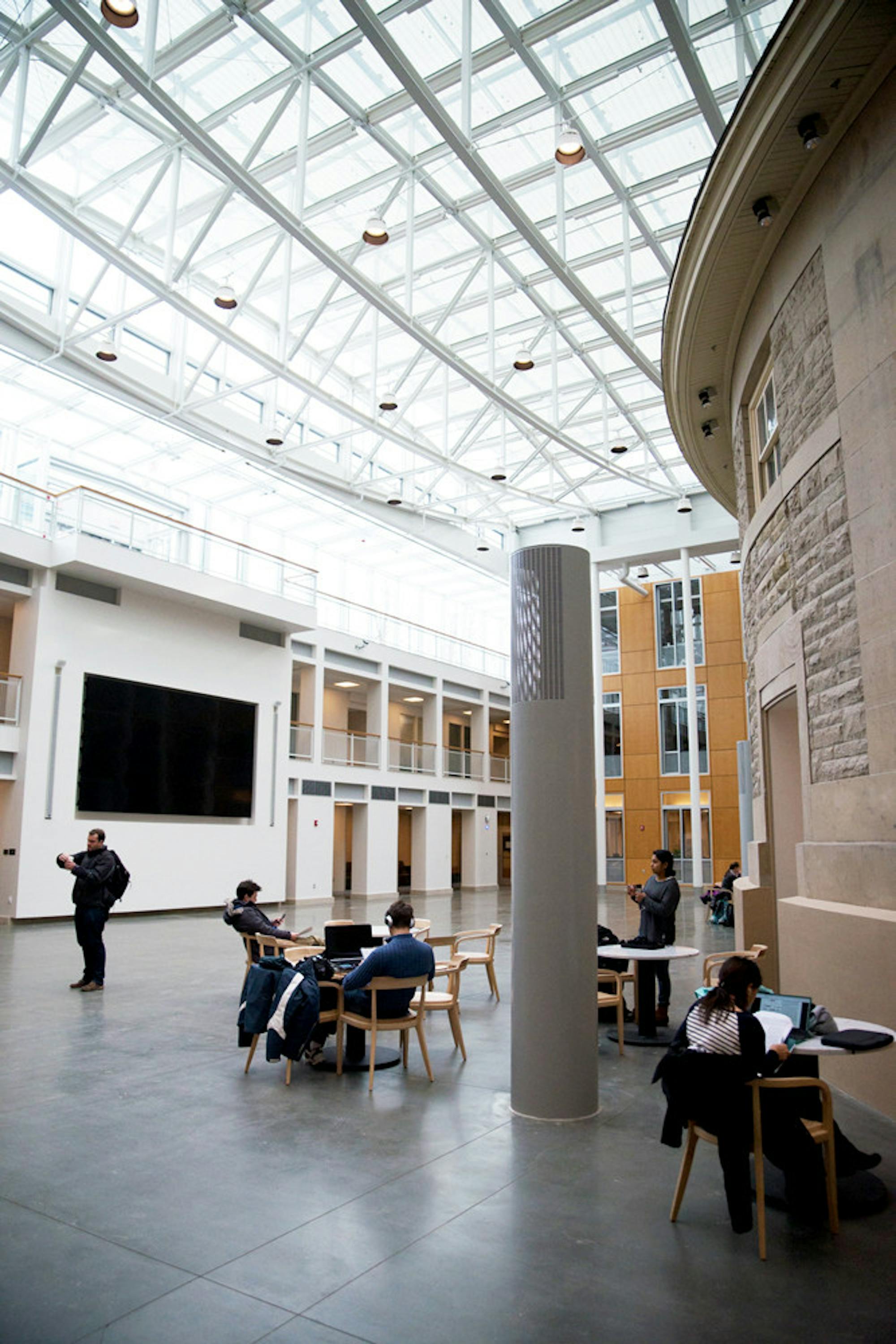 The atrium features a large television screen facing the Goldwin Smith rotunda.
