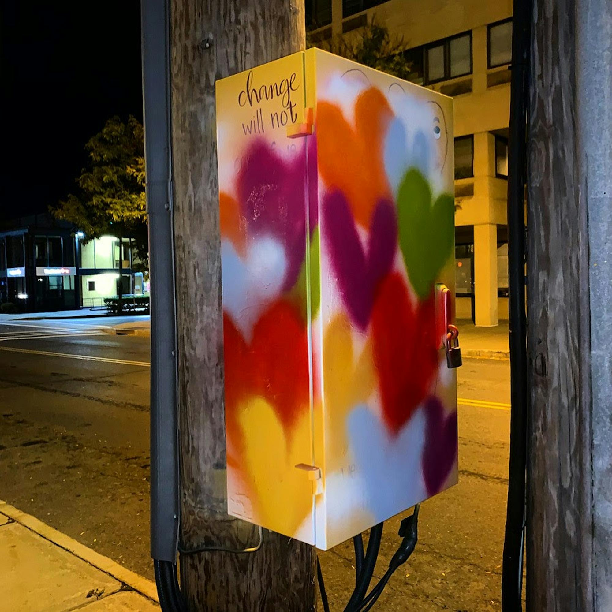 The vandalism is covered with hearts, courtesy of Linda Orinda.