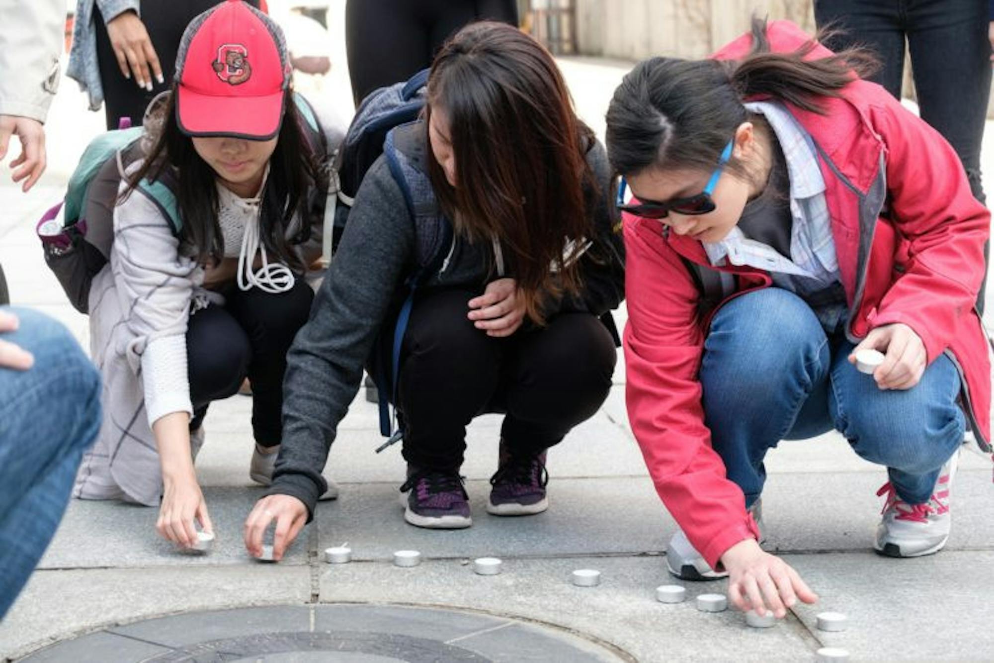 Students remember Joyce Shi at a memorial event at Ho Plaza on Wednesday, 12 April.