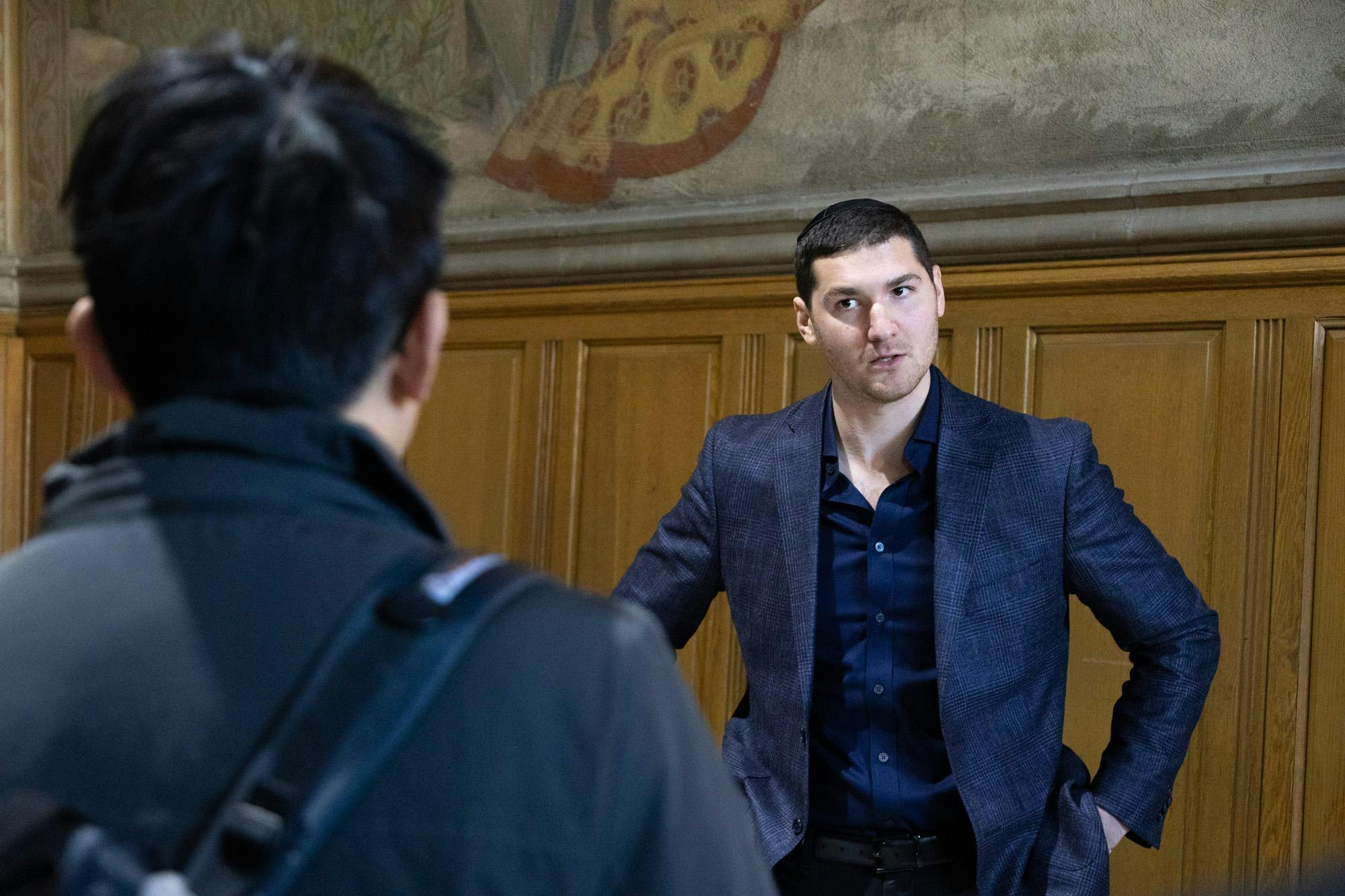 Sam Fried Engaging With a Student