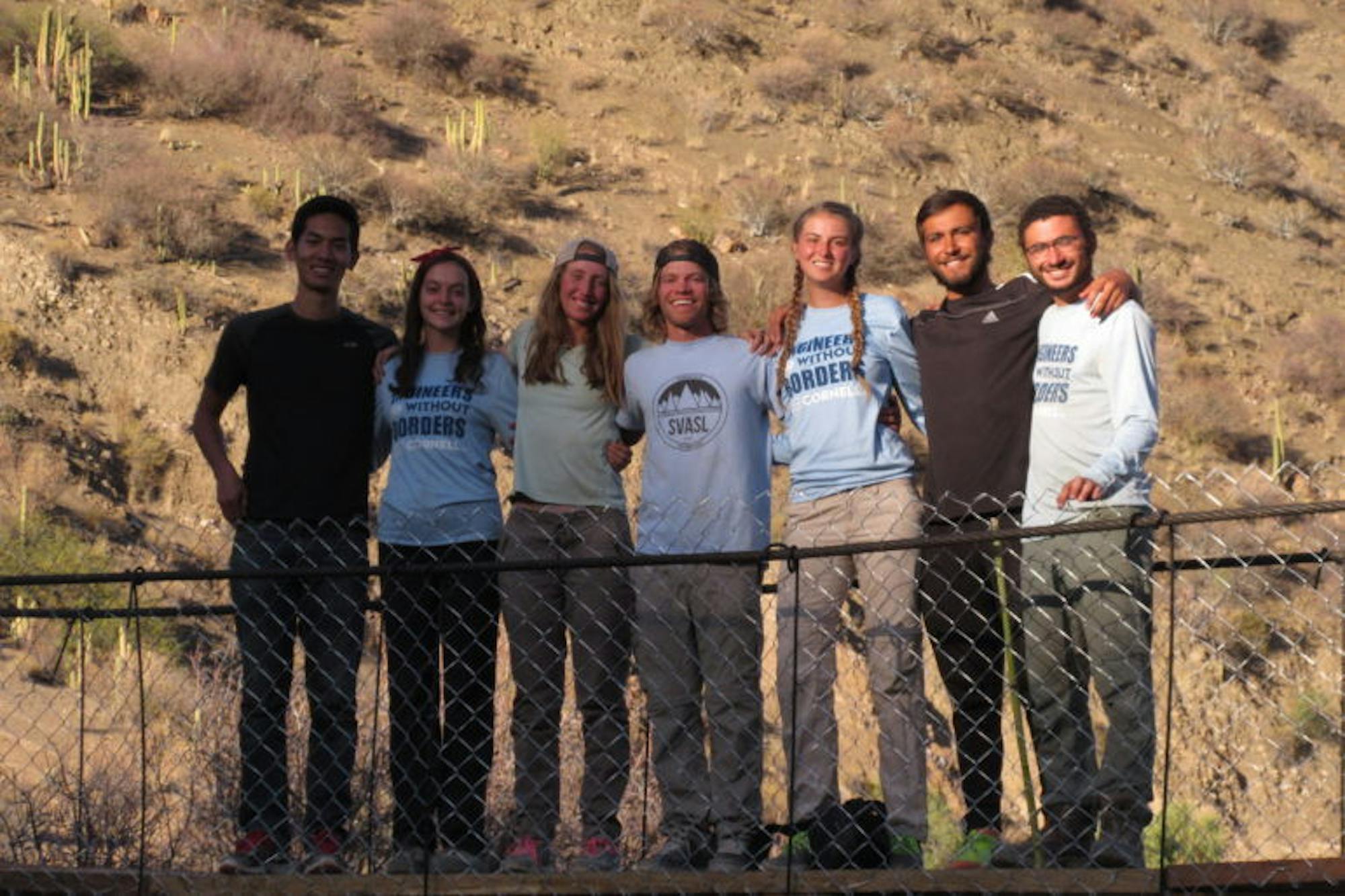 Members of Cornell Engineering Without Borders on the completed bridge in 2016.