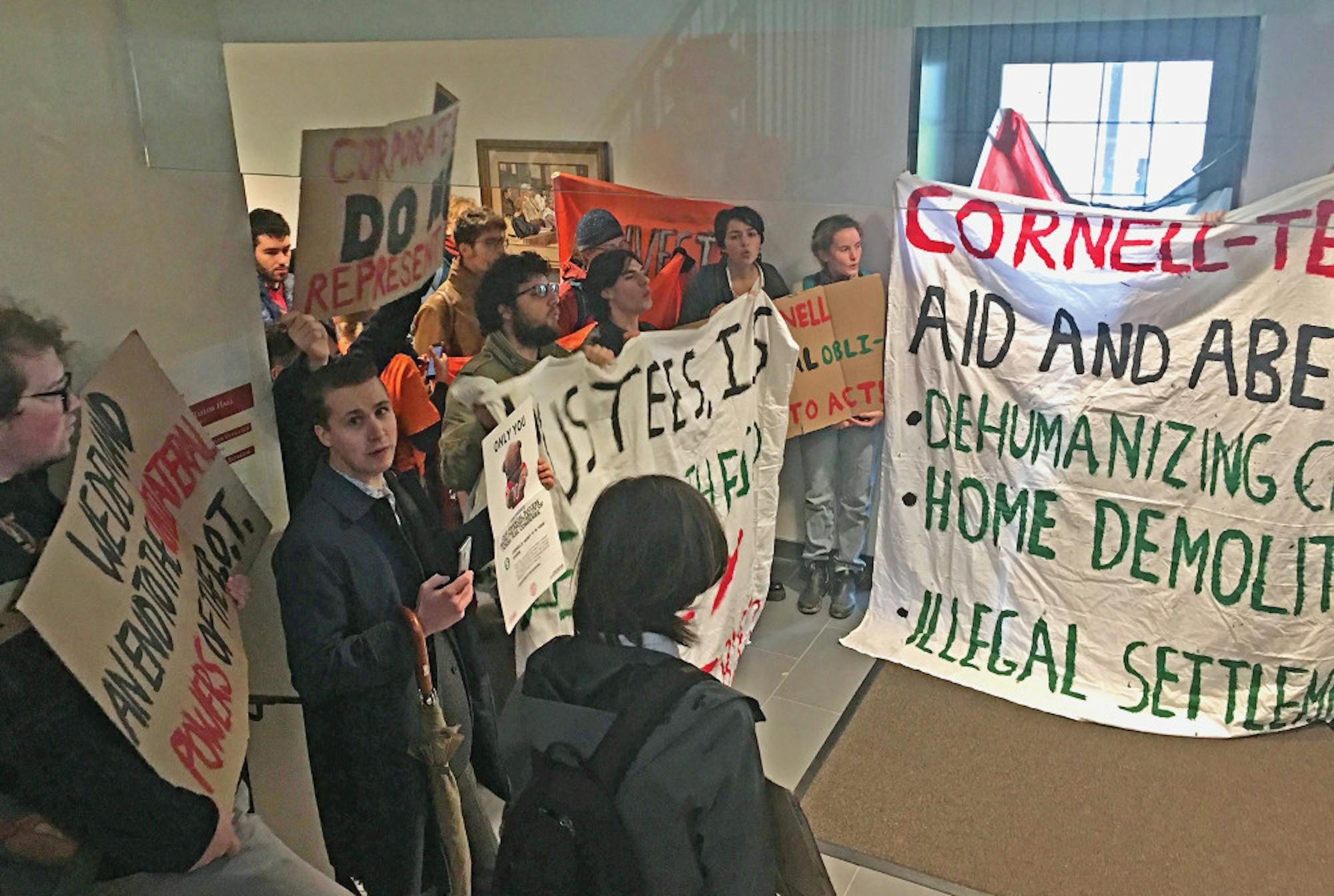 Pg-1-Trustee-Protest-by-Justine-Kim-