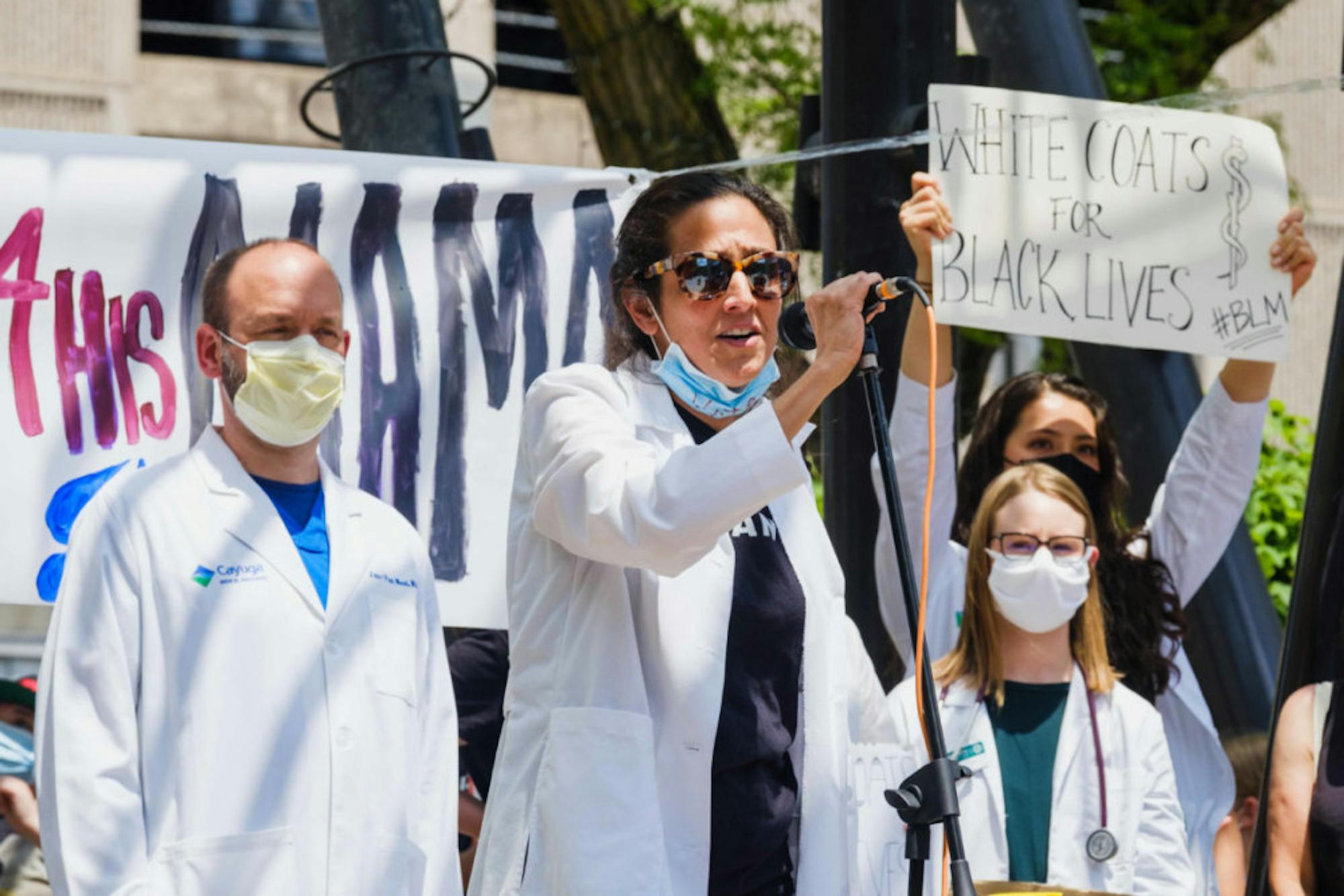 Ithaca doctors demonstrate their support for the Black Lives Matter Movement. At the rally, speakers outlined programs to combat racial inequality against Black people and discussed how to create equal access to resources for people of color in Ithaca. (Michael Suguitan / Sun Staff Photographer).
