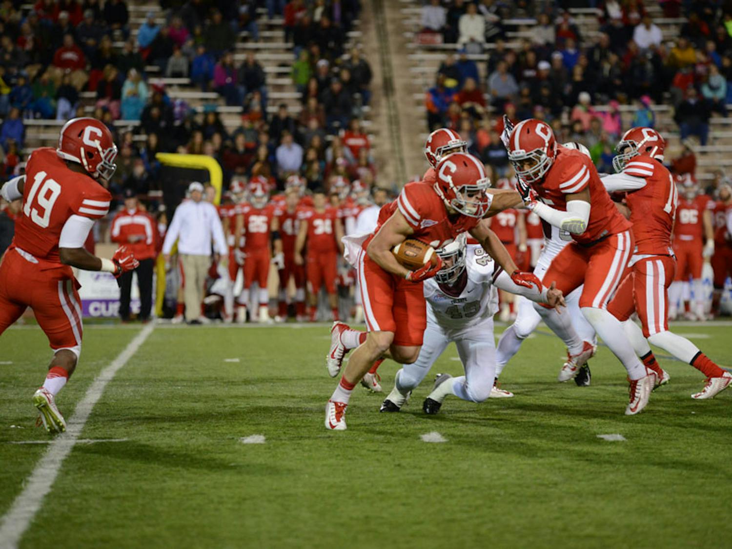 Pg-16-Football-by-Hui-Tong-Staff