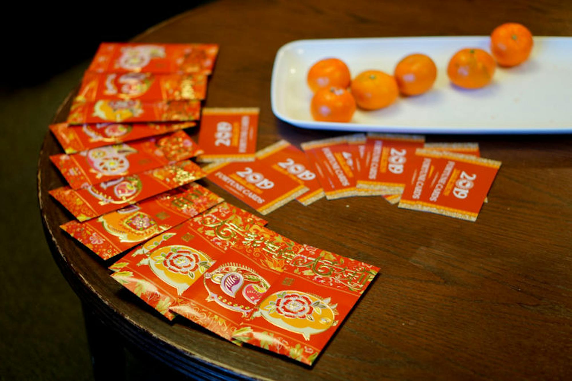 Tatkon Center celebrates Lunar New Year with traditional red envelopes.