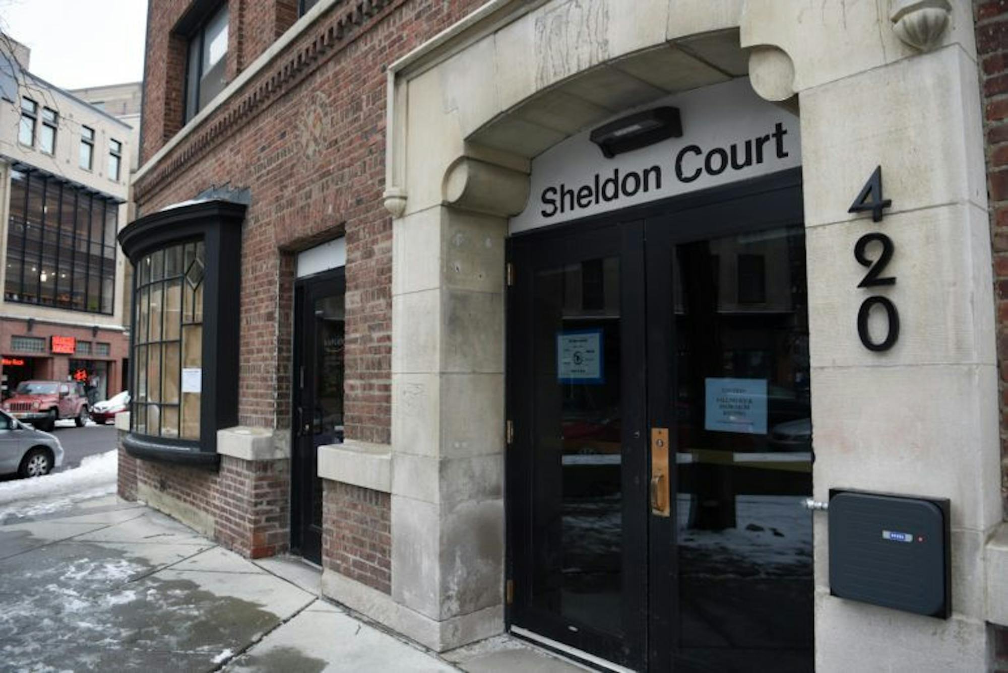 The new Collegetown Bagels location, left, and the student dormitory entrance, right, at Sheldon Court on Jan. 19.