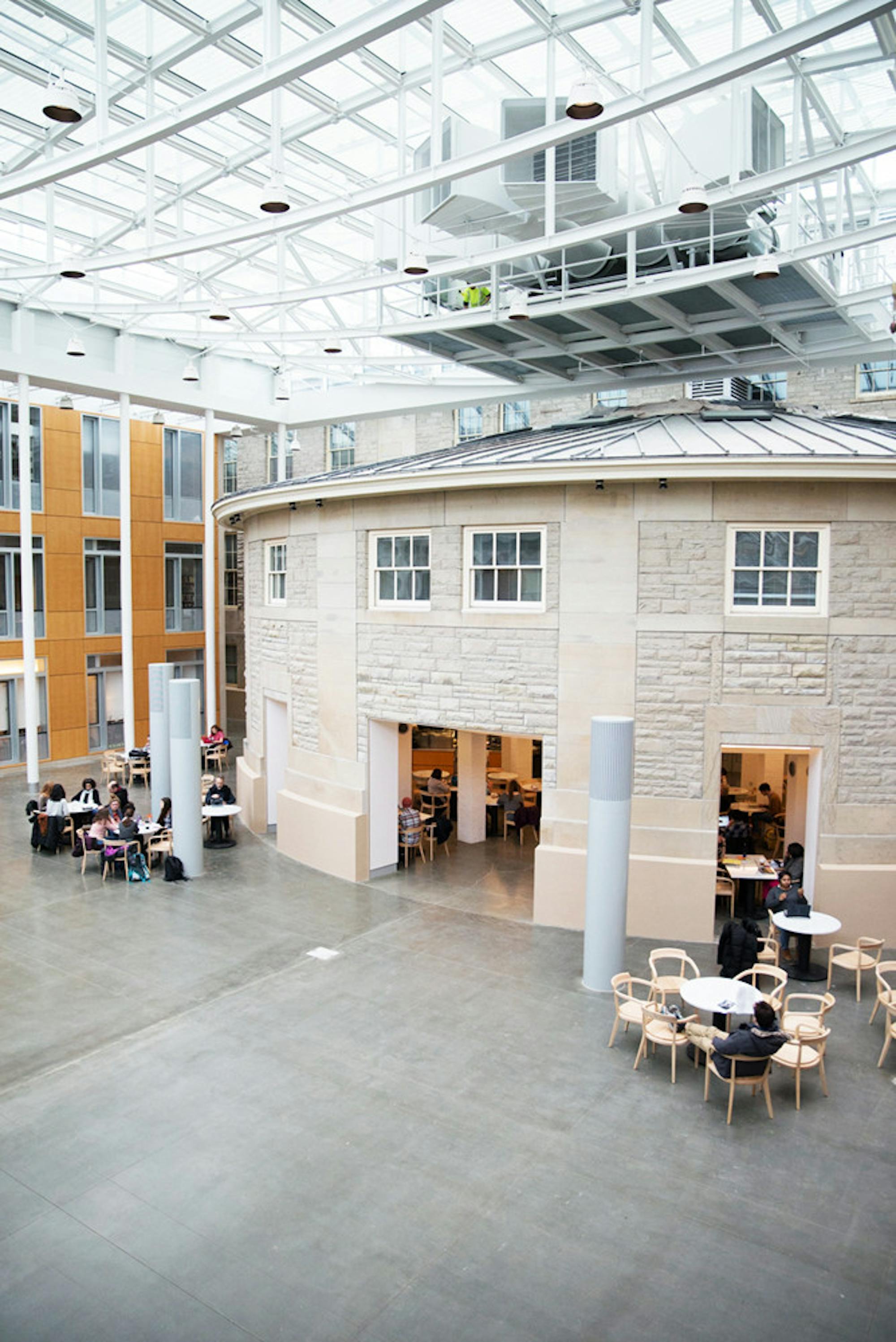 Klarman Hall adjoins Goldwin Smith Hall, with its atrium containing the older humanities building's rotunda.