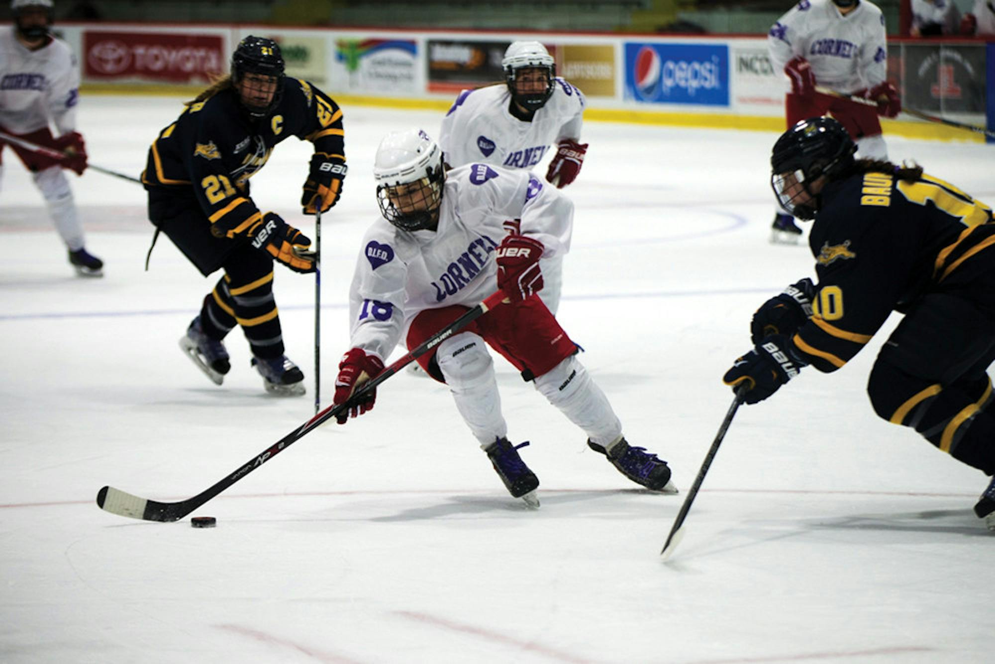 Pg-12-W-Hockey-by-Cameron-Pollack-Senior-Photographer