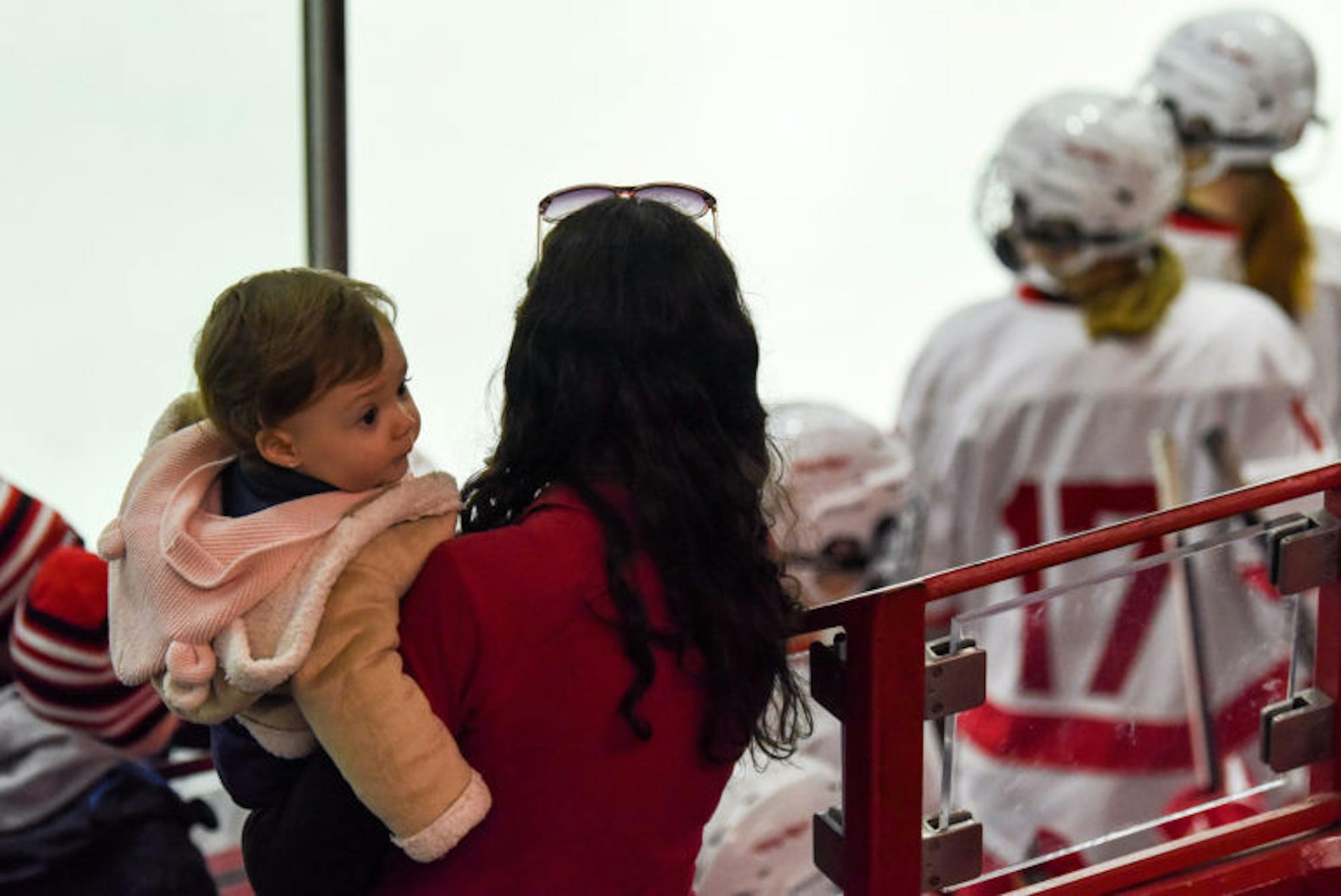 Spectators at the women's hockey game on Saturday. (Boris Tsang / Sun Assistant Photography Editor)