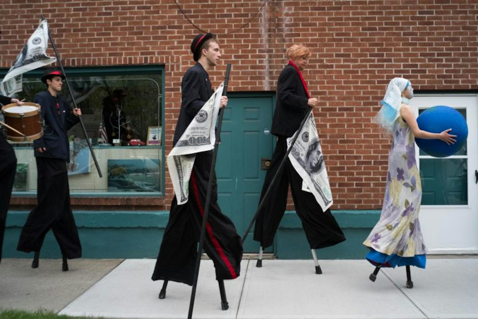 Demonstrators rallied at the Ithaca Commons and marched to The Space at Greenstar for the Climate March in recognition of Earth Day, 29 April.