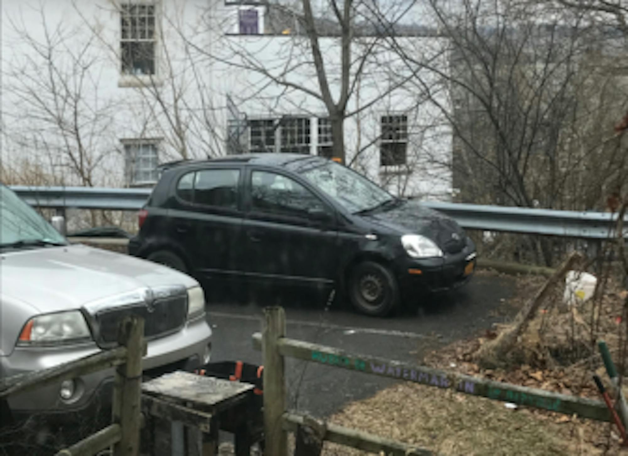 Police pulled over the two men, who were driving the Toyota Echo, and accused them of stealing the vehicle. Police later moved the car to the parking space above.