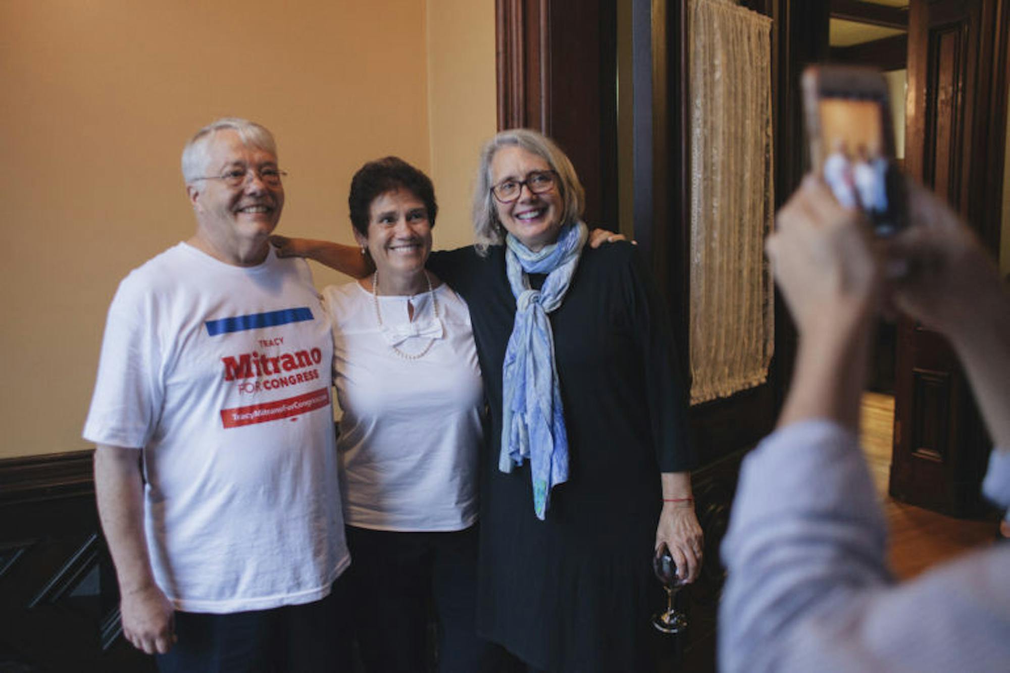 Tracy Mitrano, center, before a fundraiser in Elmira, N.Y., Oct. 2, 2018 during her first run for Congress.