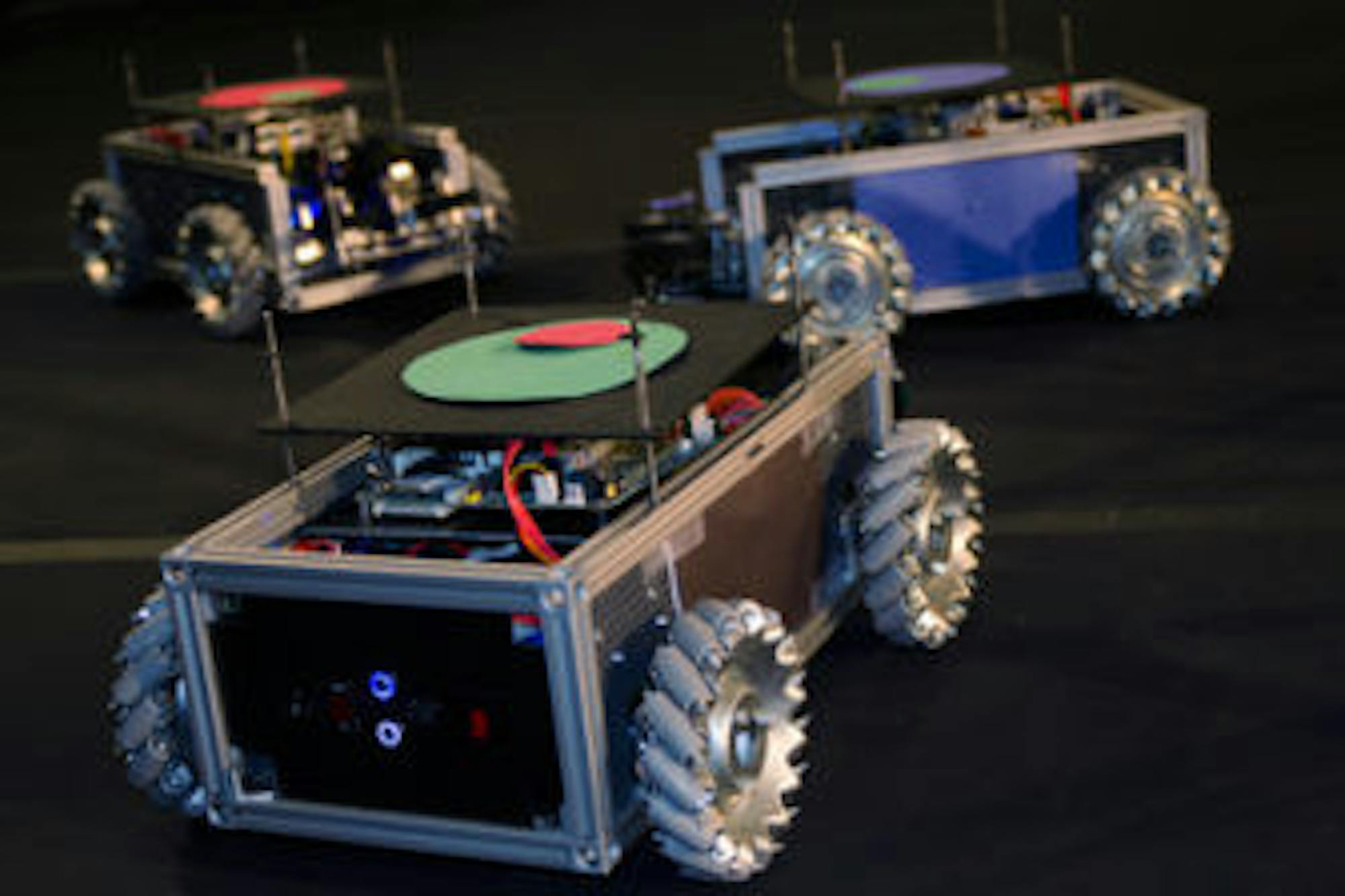 Swarm bots assembled using the team's minibot kits.