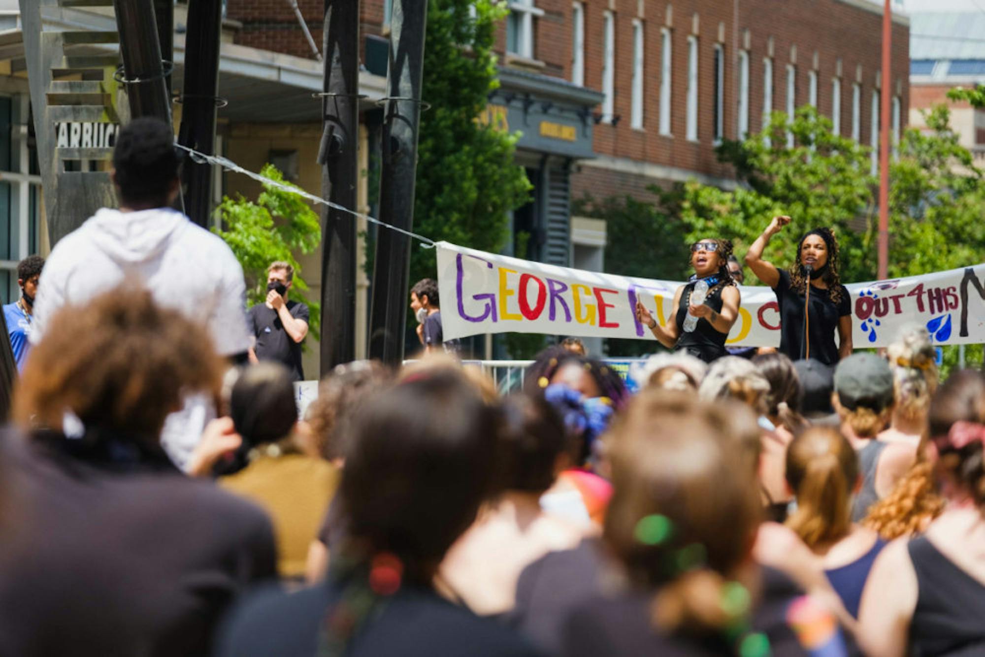 Ithacans crowd the Bernie Milton Pavilion on the Ithaca Commons as women speak about systemic racism and anti-racism efforts in Ithaca. (Michael Suguitan / Sun Staff Photographer).