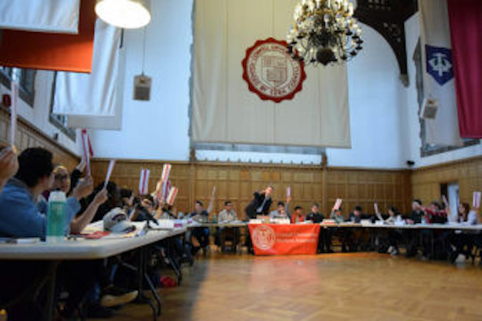 The parliamentarian, Zachary Schmetterer '18, counts votes during a procedural vote at a Student Assembly Meeting on Thursday, April 12th, 2018.