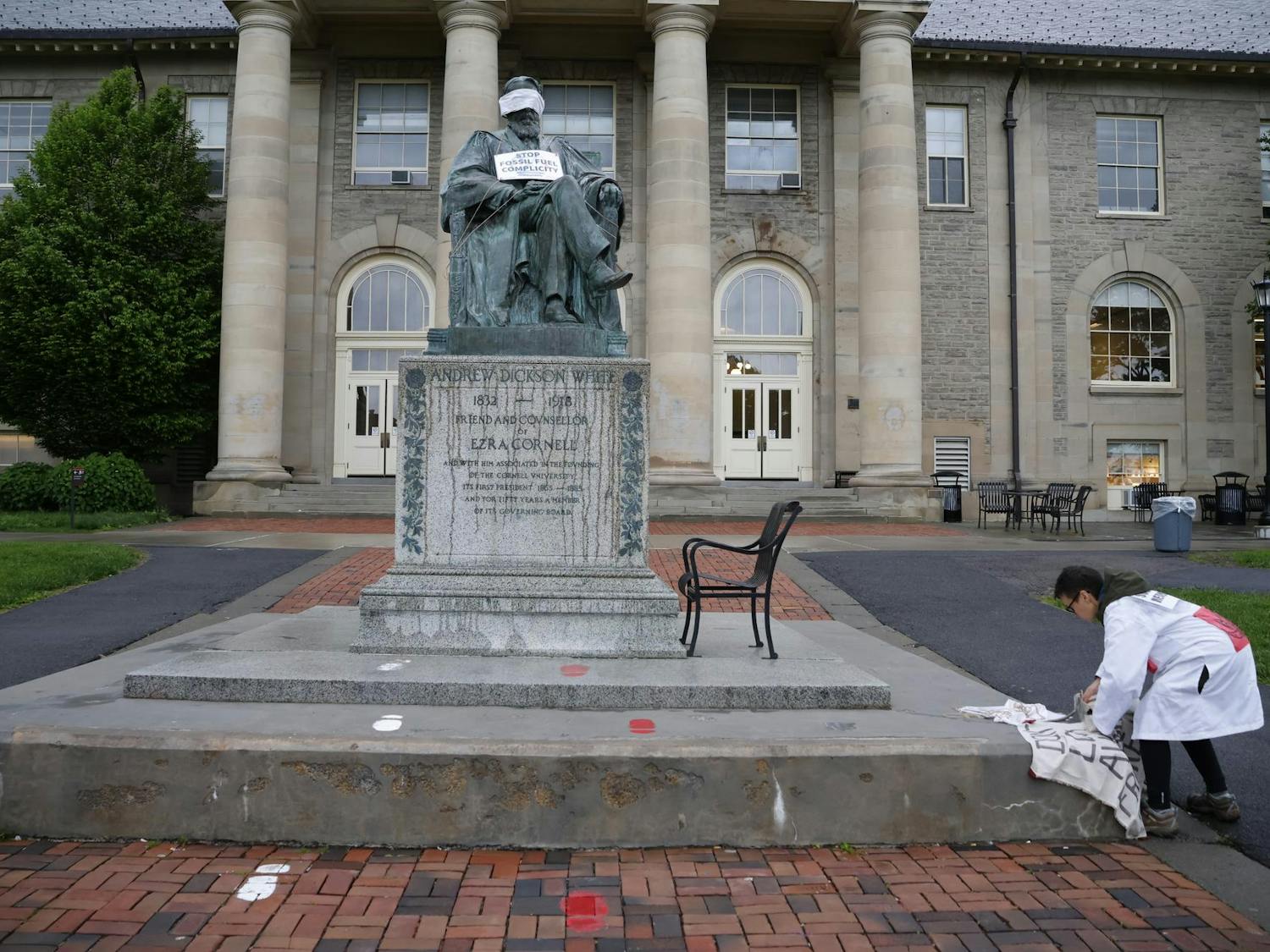 AD White Statue Protest