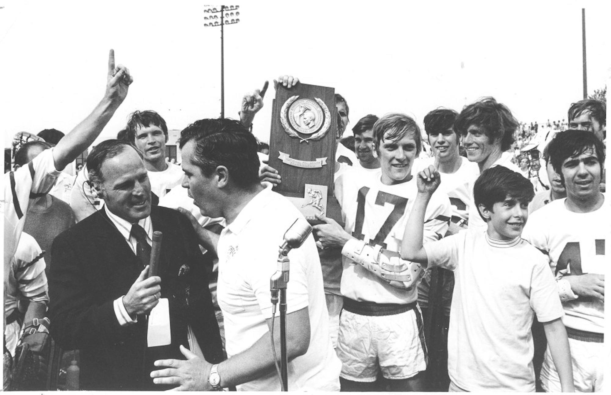 Moran being interviewed after he won the 1971 championship — his first of three during his tenure.