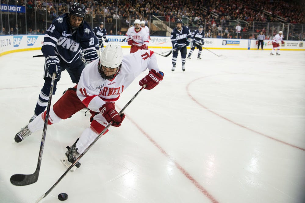 Pg-12-M-Hockey-2-by-Cameron-Pollack-Photo-Editor