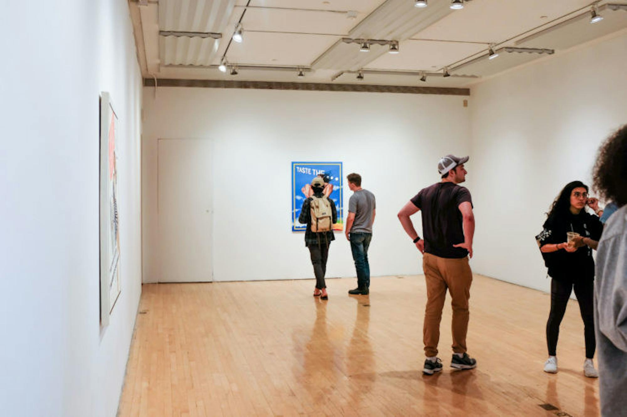 Sabine Strauch ’19 debuted her exhibition, “Women: Starting at $19.99,” at Olive Tjaden Gallery on Tuesday. She sought to draw attention to the commodification of the female body in advertising through artwork. (Michael Wenye Li / Sun Photography Editor)