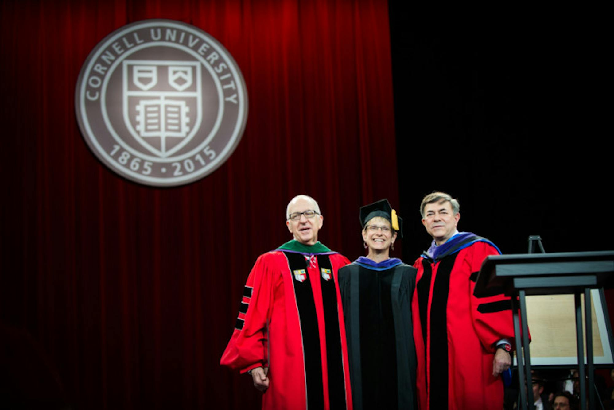 President Garret sings the alma mater with President Emeritus David J. Skorton and Chairman of the Cornell University Board of Trustess Robert Harrison on Charter Day.