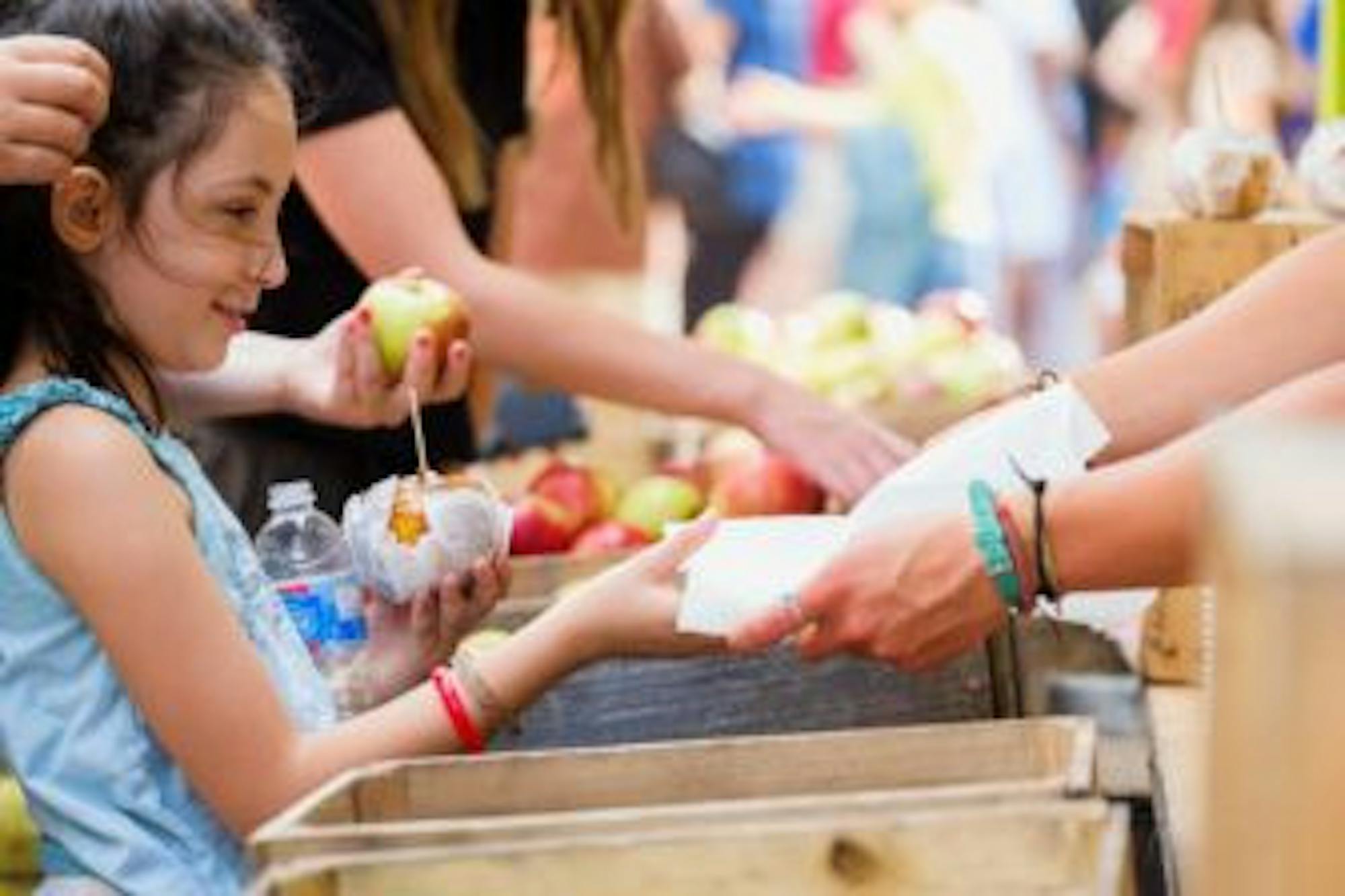 Ithacans gather in the Commons for the annual Apple Harvest Festival on Saturday, Sep 28. (Michael Suguitan / Sun Senior Photographer).