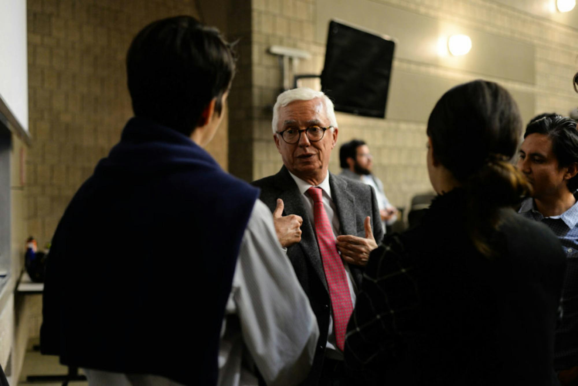 Robledo speaks to students after a lecture in Ives Hall Thursday.