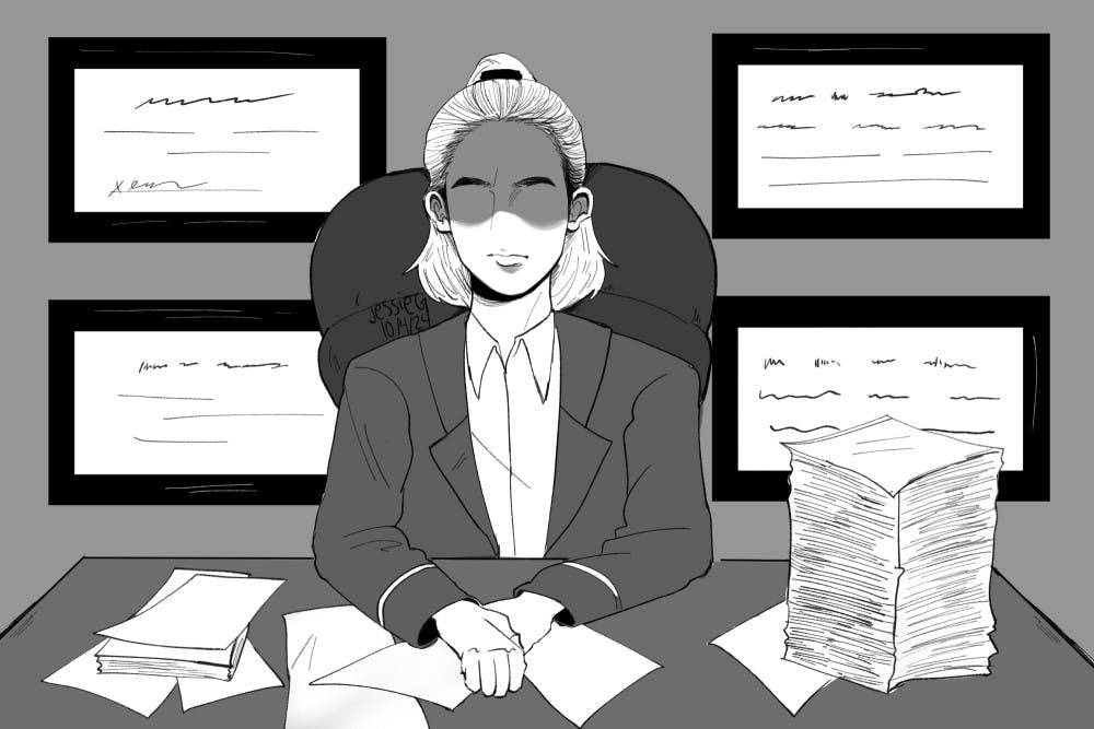 Person-sitting-at-desk-Graphic-Jessie-Guillen