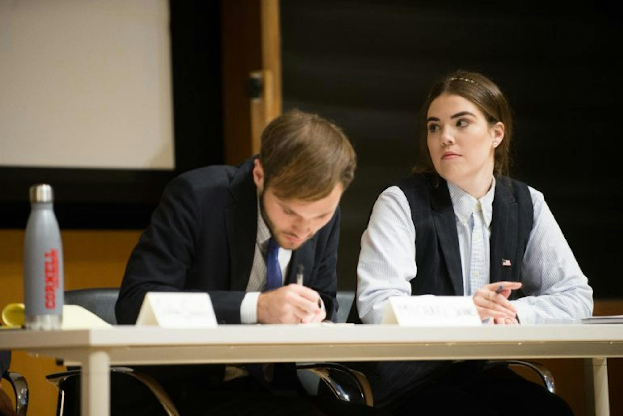 Olivia Corn '19 and Michael Johns '20 defeat the Cornell Democrats in a debate on Tuesday.