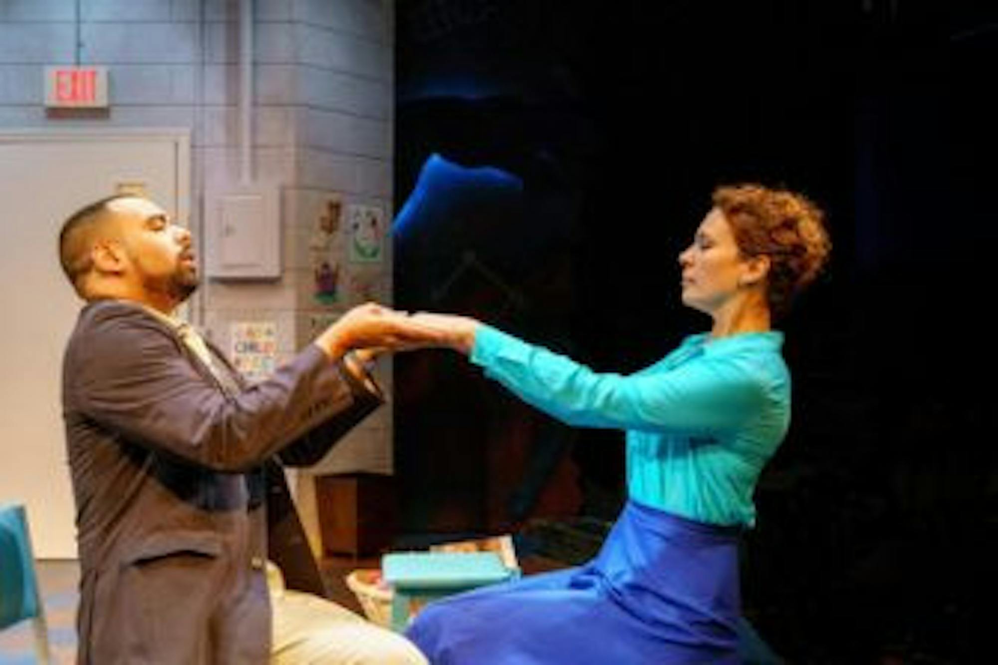 Aundre Seals as Pastor Greg and Erica Steinhagen as Margery.