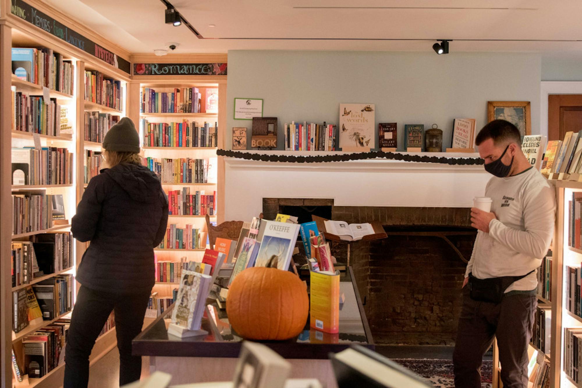 Customers browse through Odyssey Bookstore on Oct. 24.