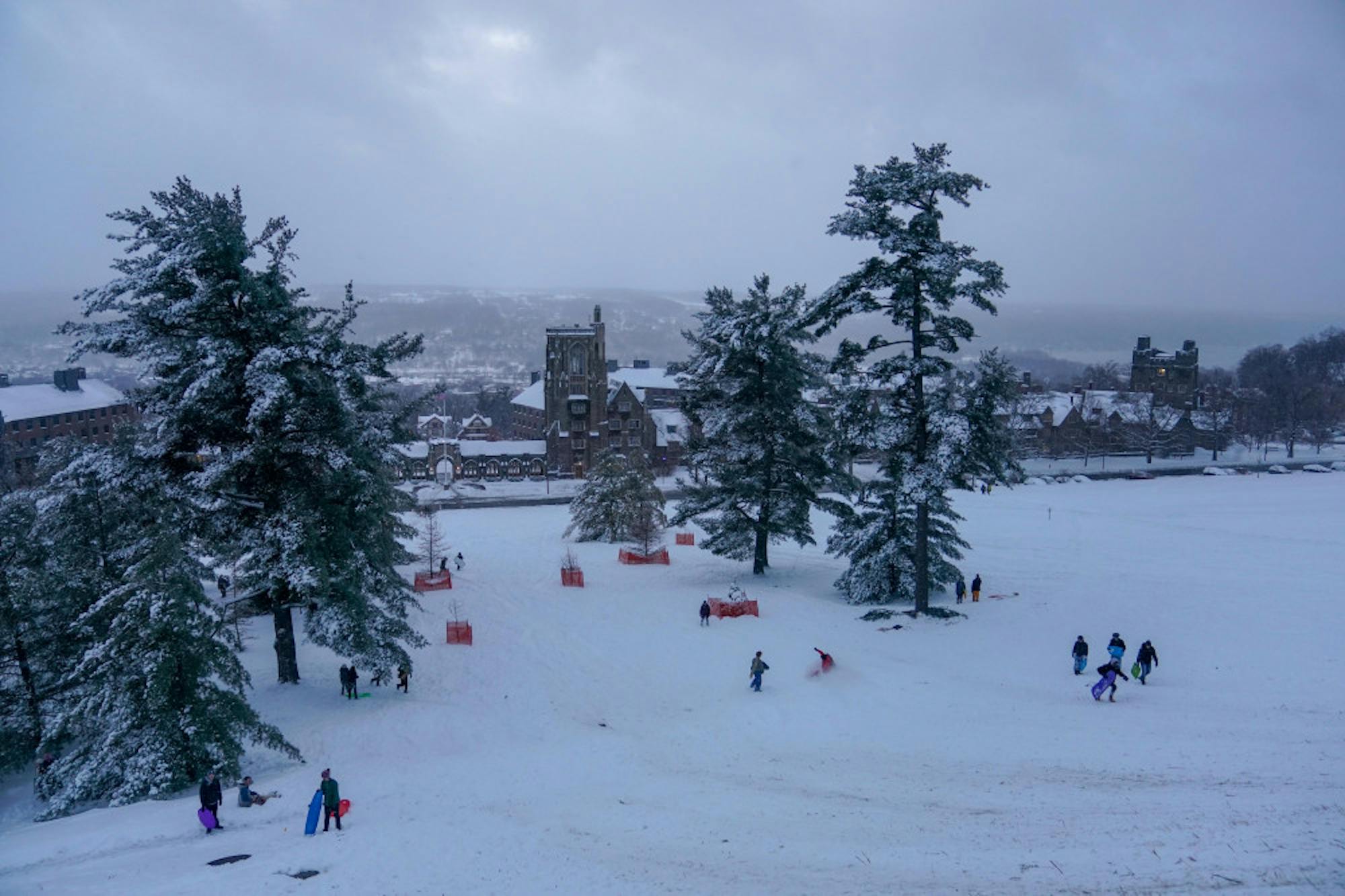 Libe Slope transformed from a steep path to a ski and sledding slope on the snow day on Friday. (Ben Parker/Sun Assistant Photography Editor)