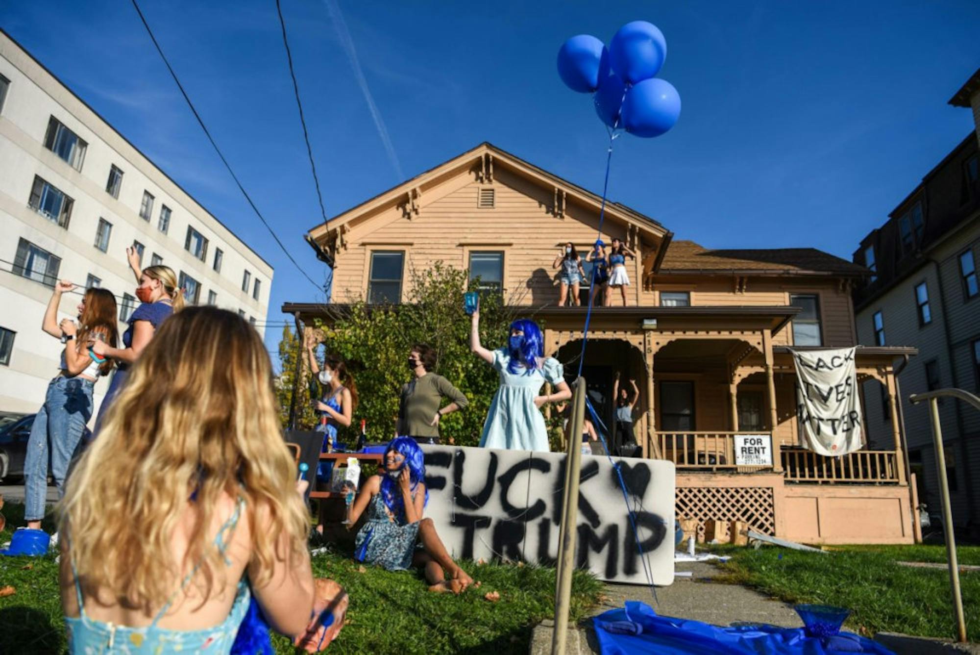 The Cornell campus cheered and exhaled a sigh of relief, as election week finally ended — taking to porches for celebrations.